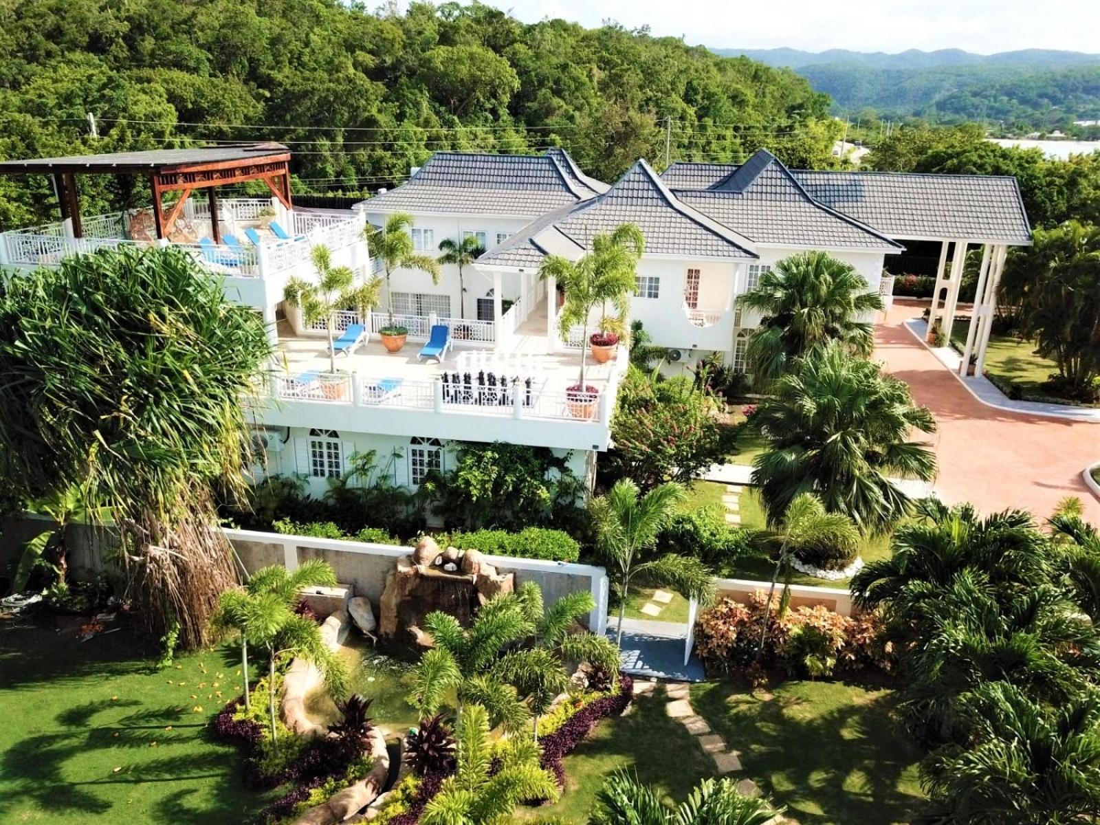 Mais Oui Villa Discovery Bay Esterno foto
